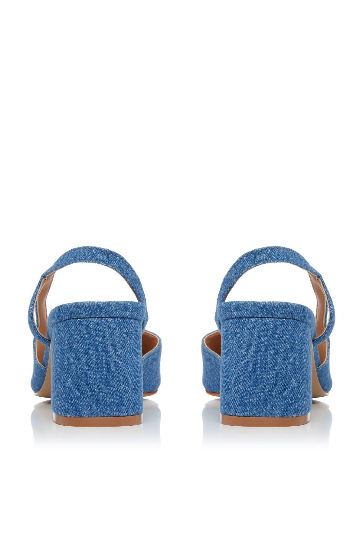Blue denim slingback sandals with back strap and tan heel lining