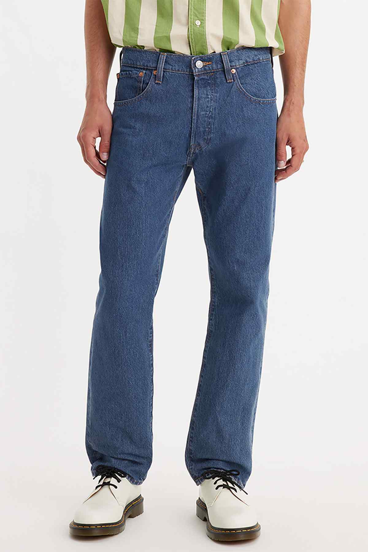 Levi's medium indigo worn-in denim jeans, straight-leg with button fly and belt loops