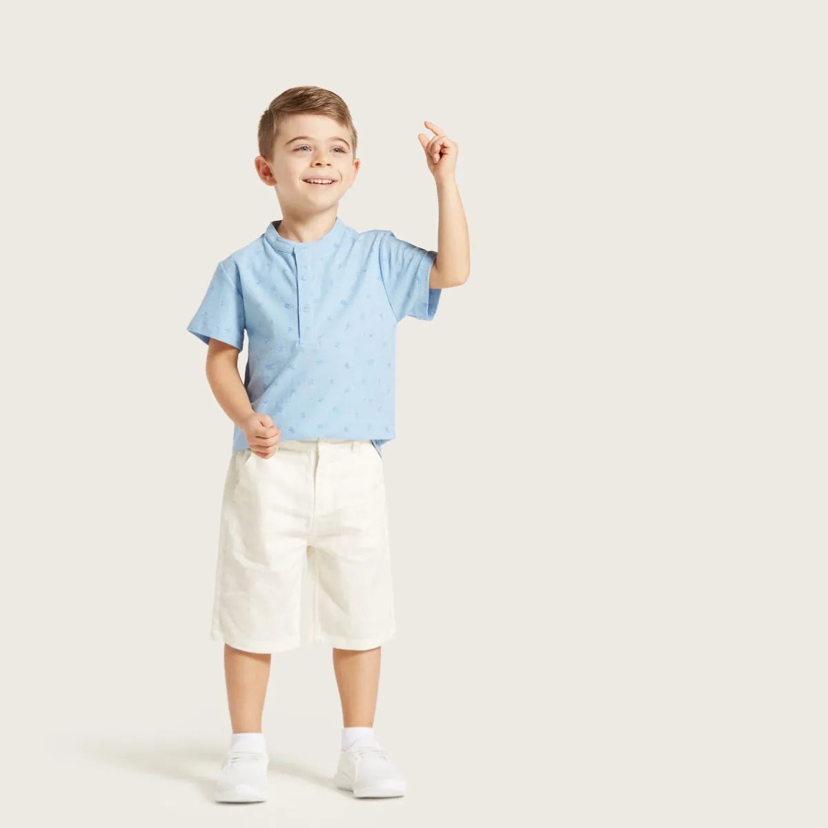 BABYSHOP light blue short-sleeve button-up top with small scattered dots