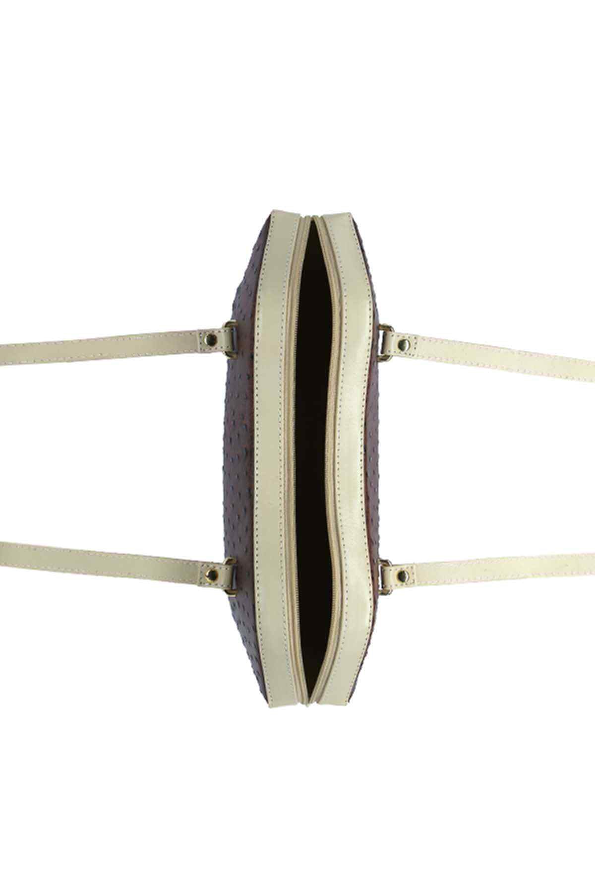 Lafanzo tote bag side view showing cream lining and top handles