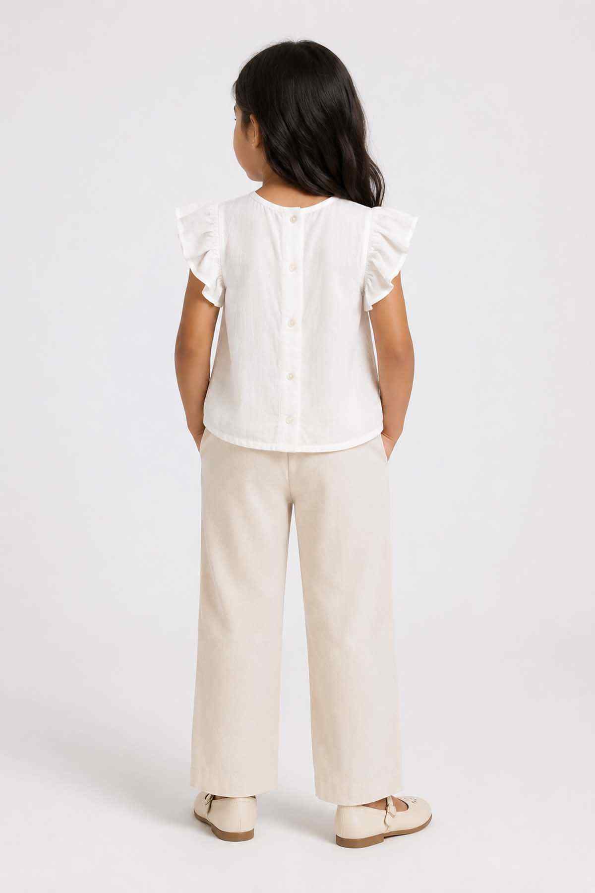 Cream baby girls' top with vertical back buttons and flutter sleeves
