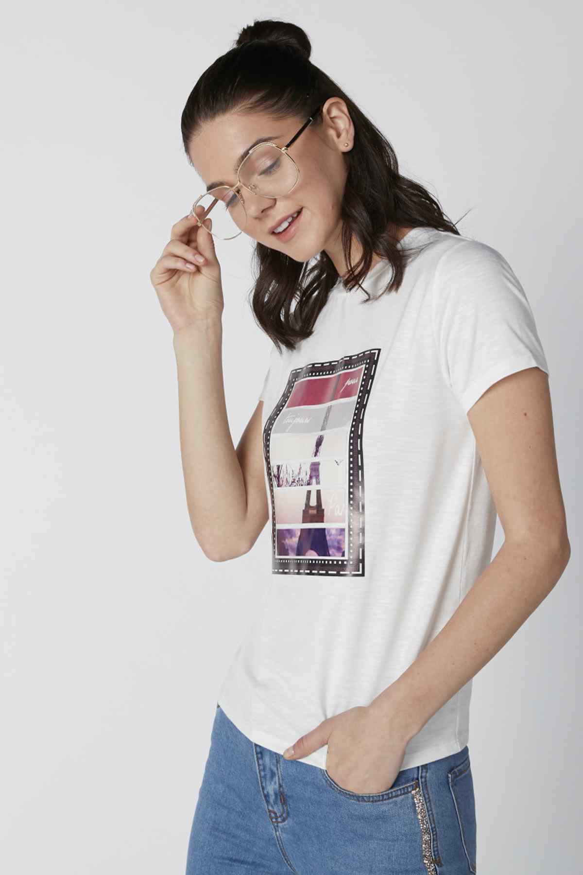 White crew-neck short-sleeve T-shirt with colorful photo-style chest graphic