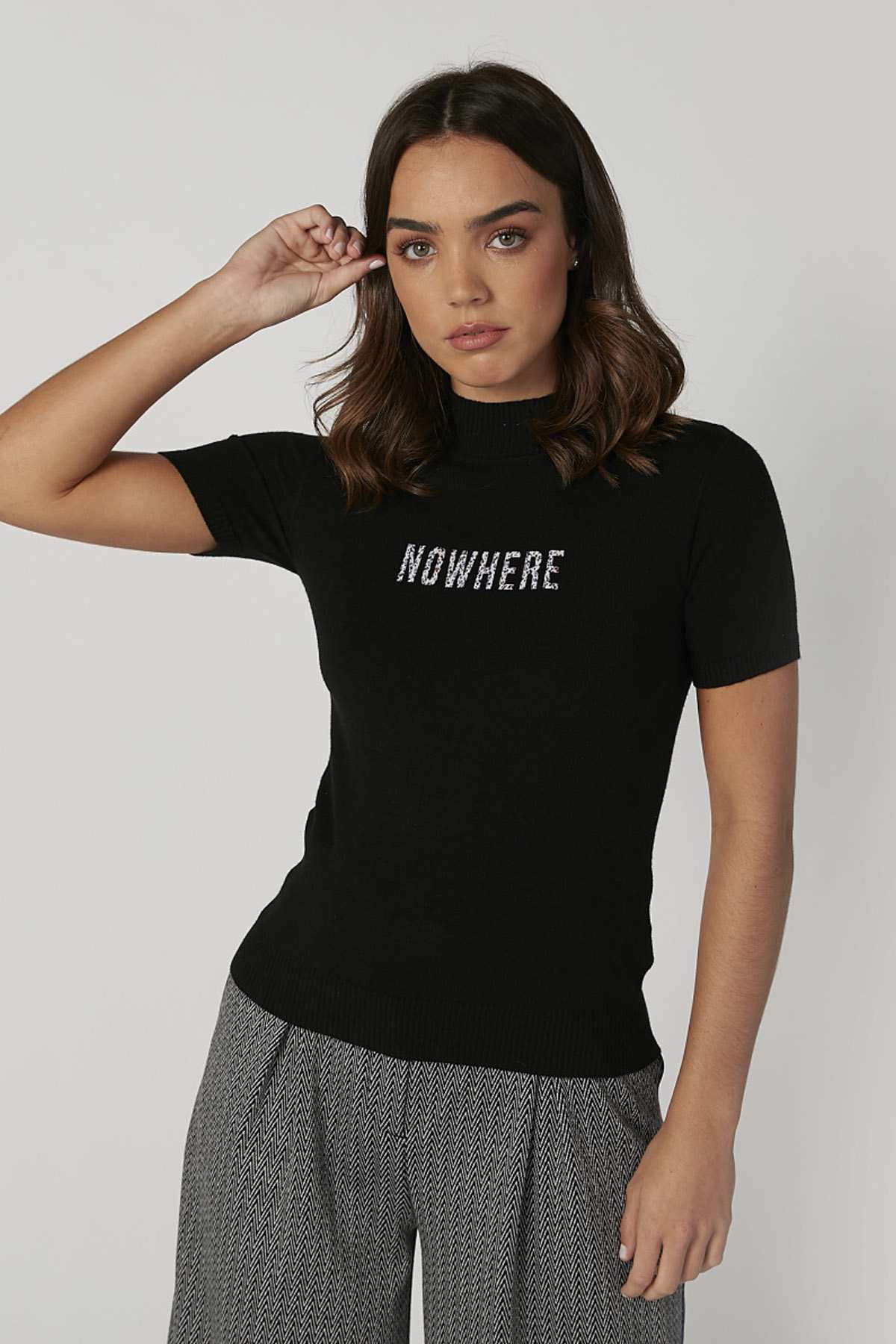 Black short-sleeve T-shirt with 'NOWHERE' printed graphic