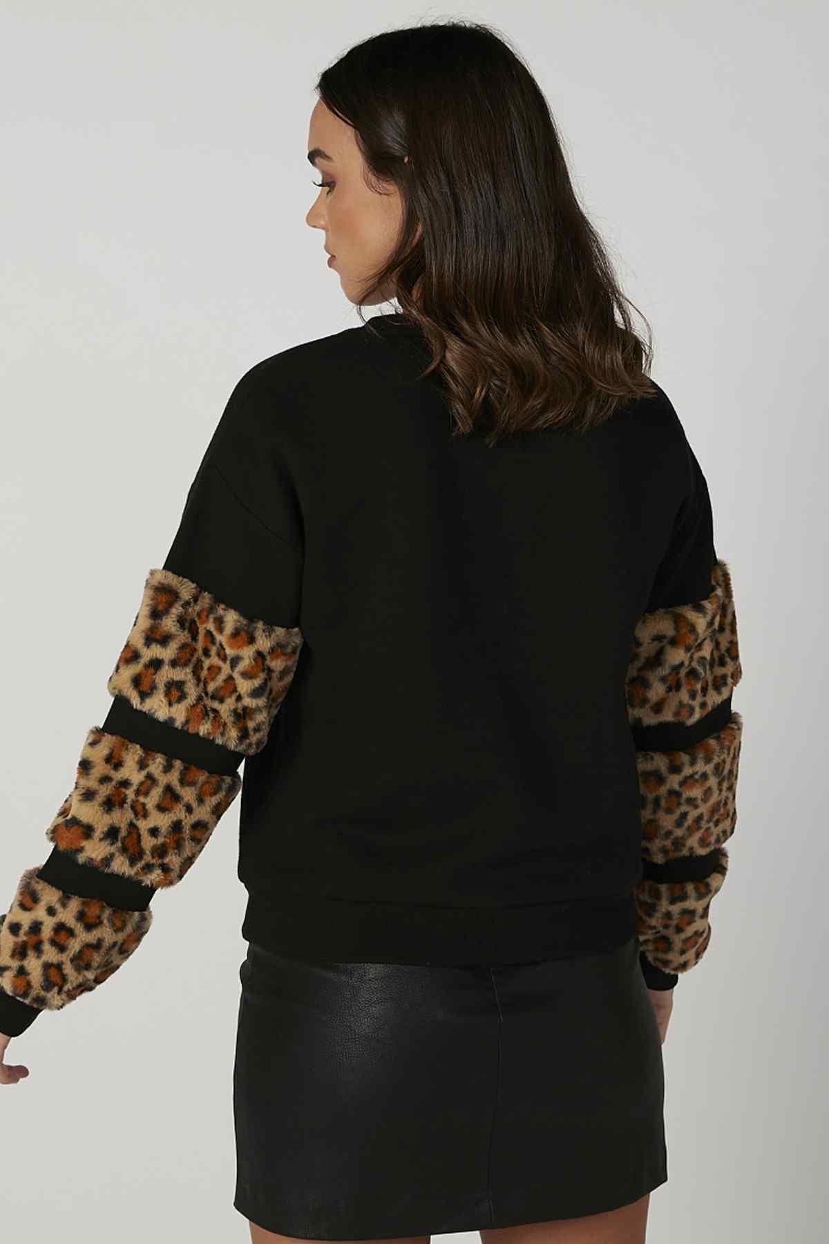Black sweatshirt with leopard-print cuffs, back view