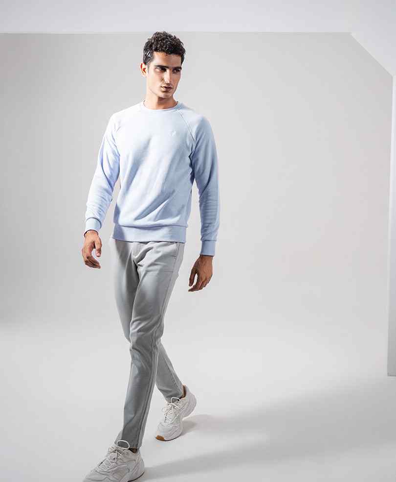 Light blue fitted crewneck long-sleeve shirt, full-body view