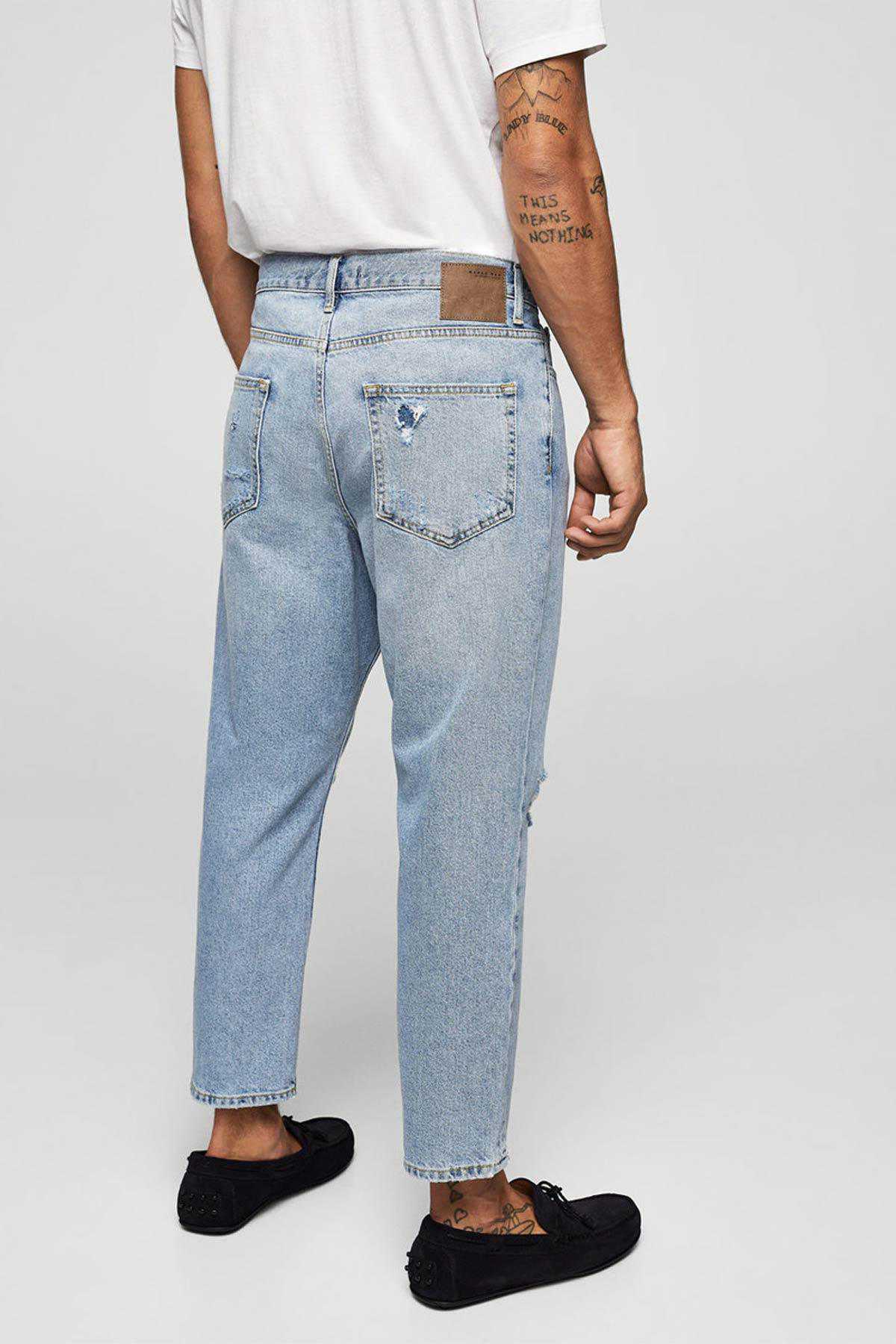 Light blue straight jeans with back patch pocket and cuffed hem