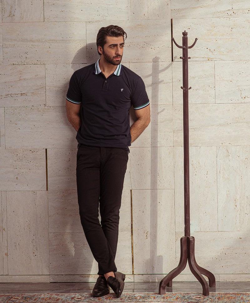Men's dark fitted polo shirt, striped collar trim and small chest logo