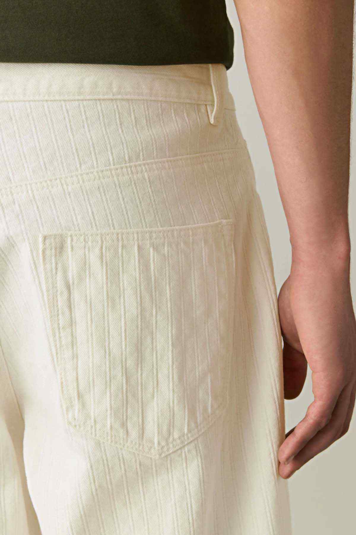 Ecru white trousers rear pocket and yoke seam, relaxed fit