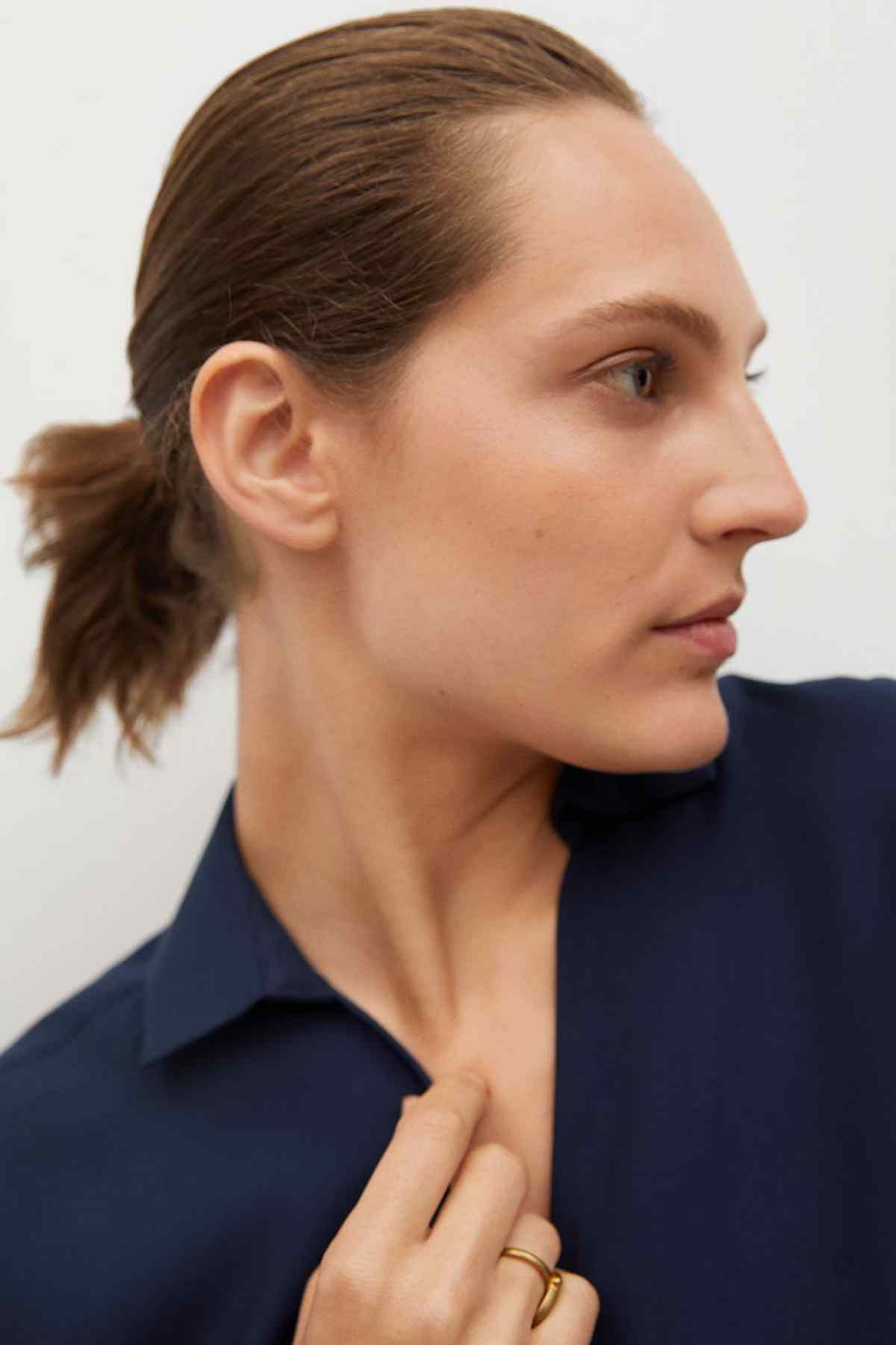 Dark navy shirt dress close-up of collar and V-shaped button opening