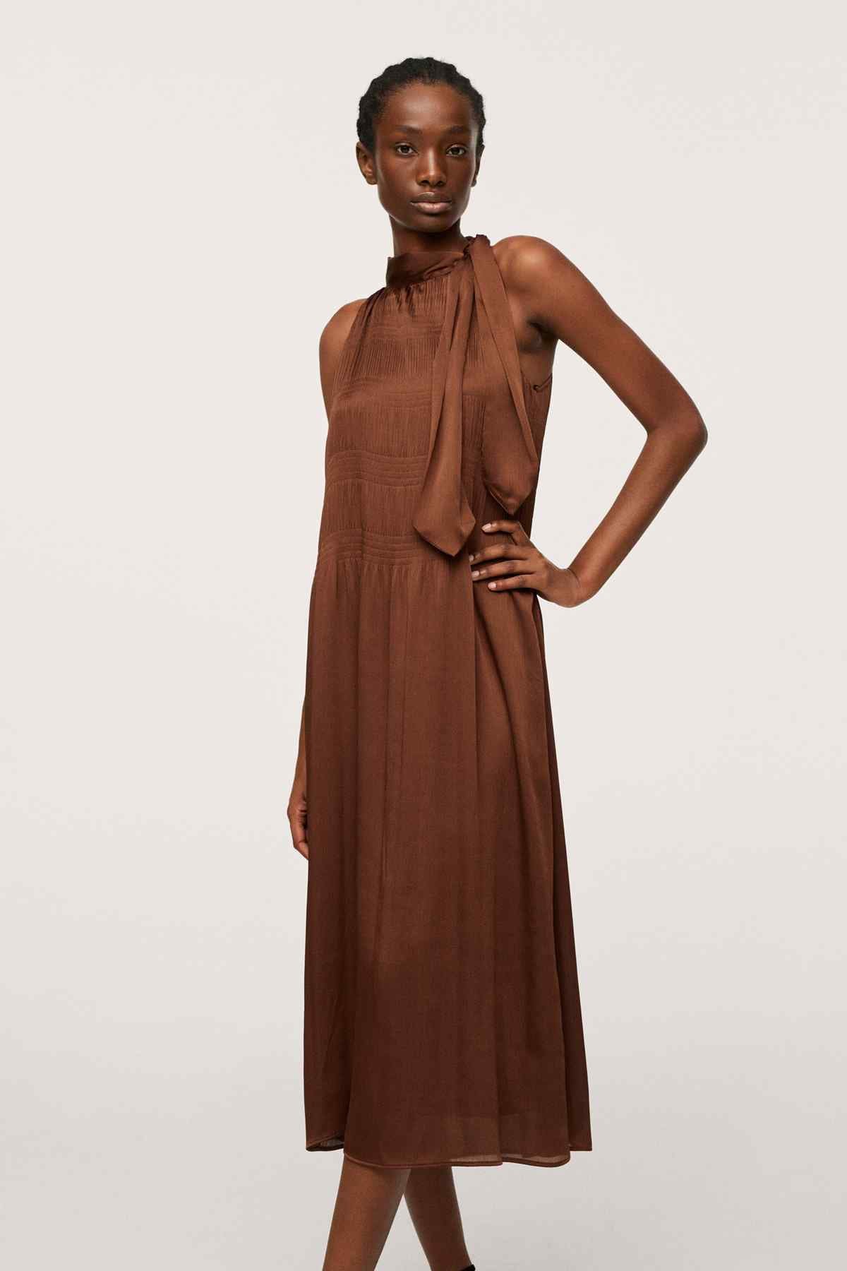 Brown sleeveless midi dress with neck tie and pleated bodice