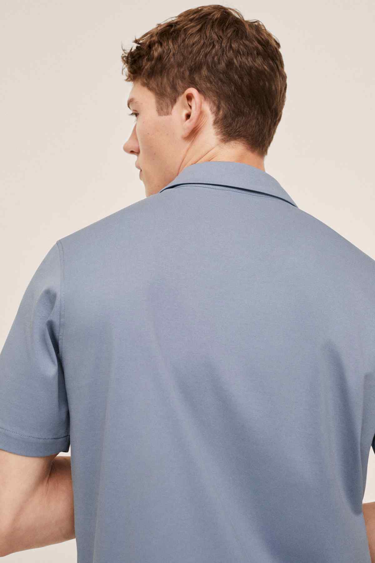 MANGO men's blue short-sleeve button-up shirt, back view with collar