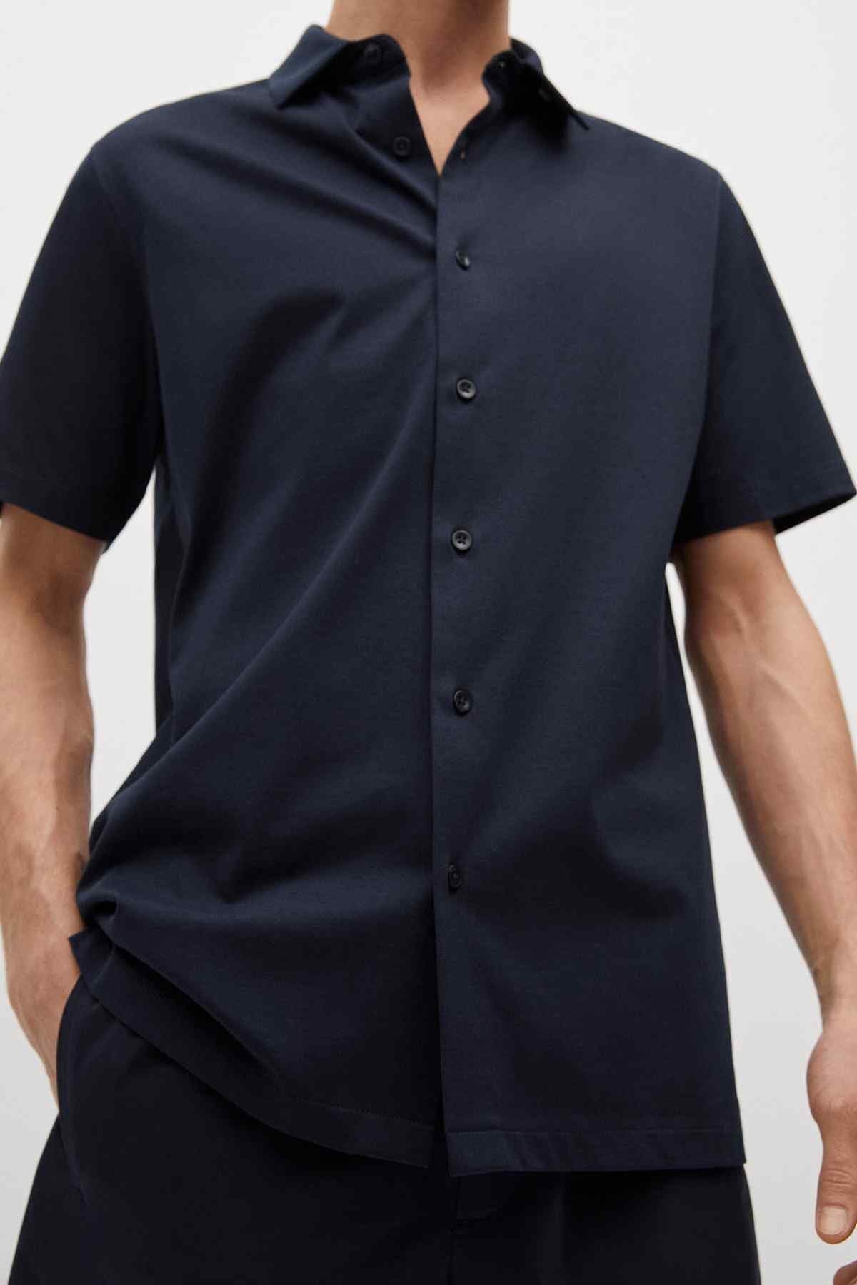 Men's dark navy short-sleeve button-up shirt, front close-up