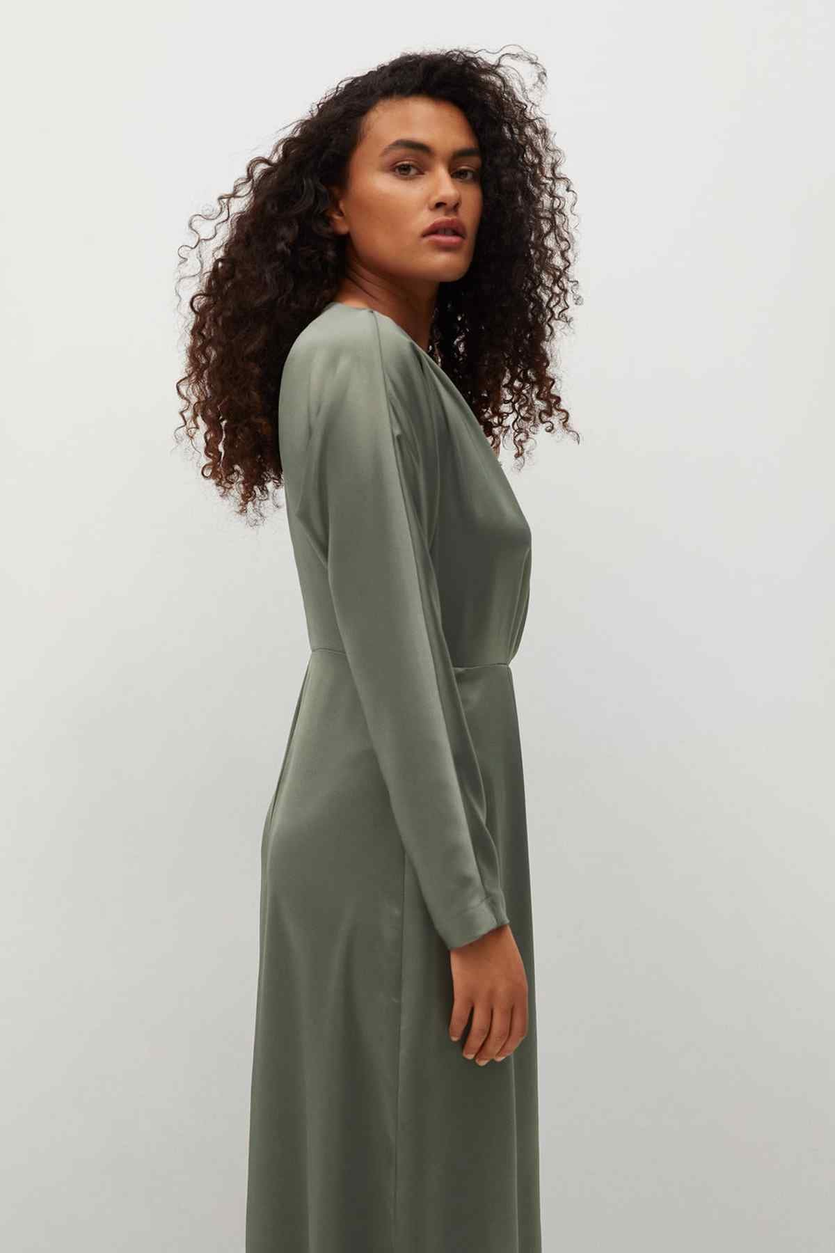 Light pastel grey wrap midi dress, side profile with long sleeves