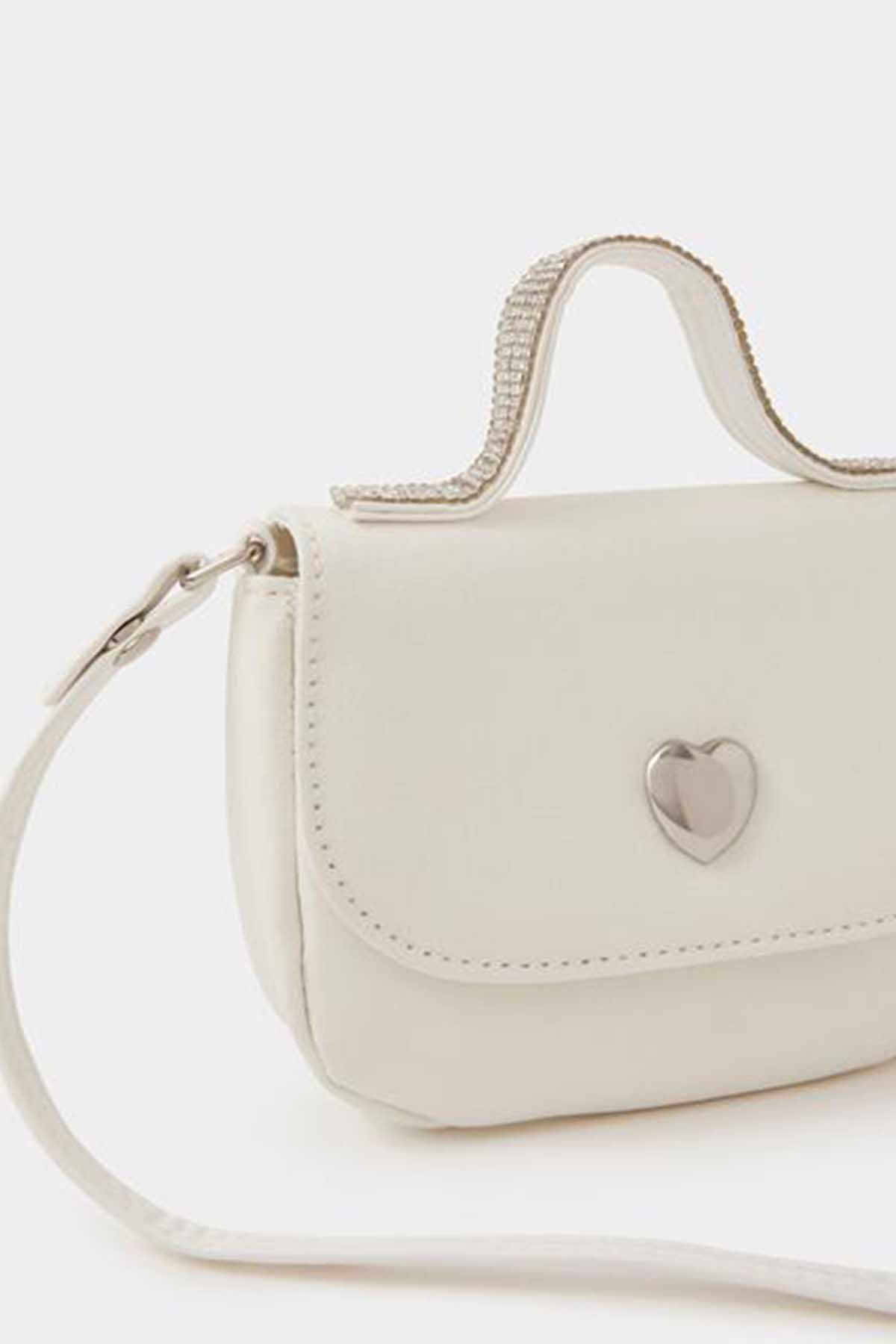 Ivory mini shoulder bag with heart-shaped metal clasp and side strap