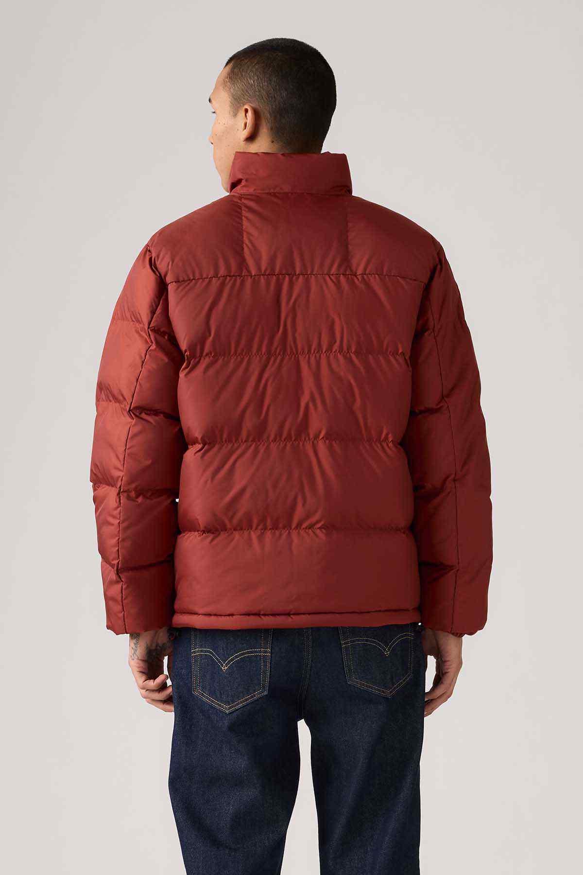 Red padded puffer jacket back view with quilted baffles and stand collar