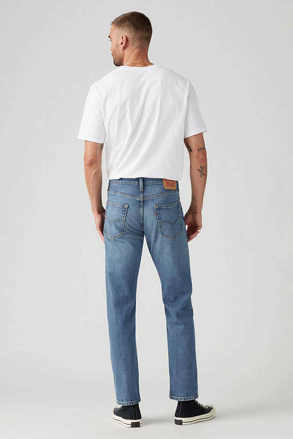 Levi's medium indigo denim jeans, back patch pockets and straight legs