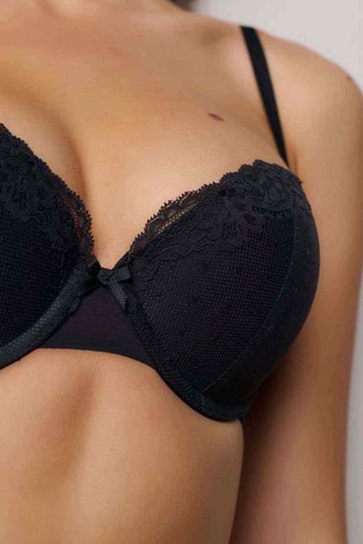 NEXT black lace underwire bra close-up, scalloped cups and center bow