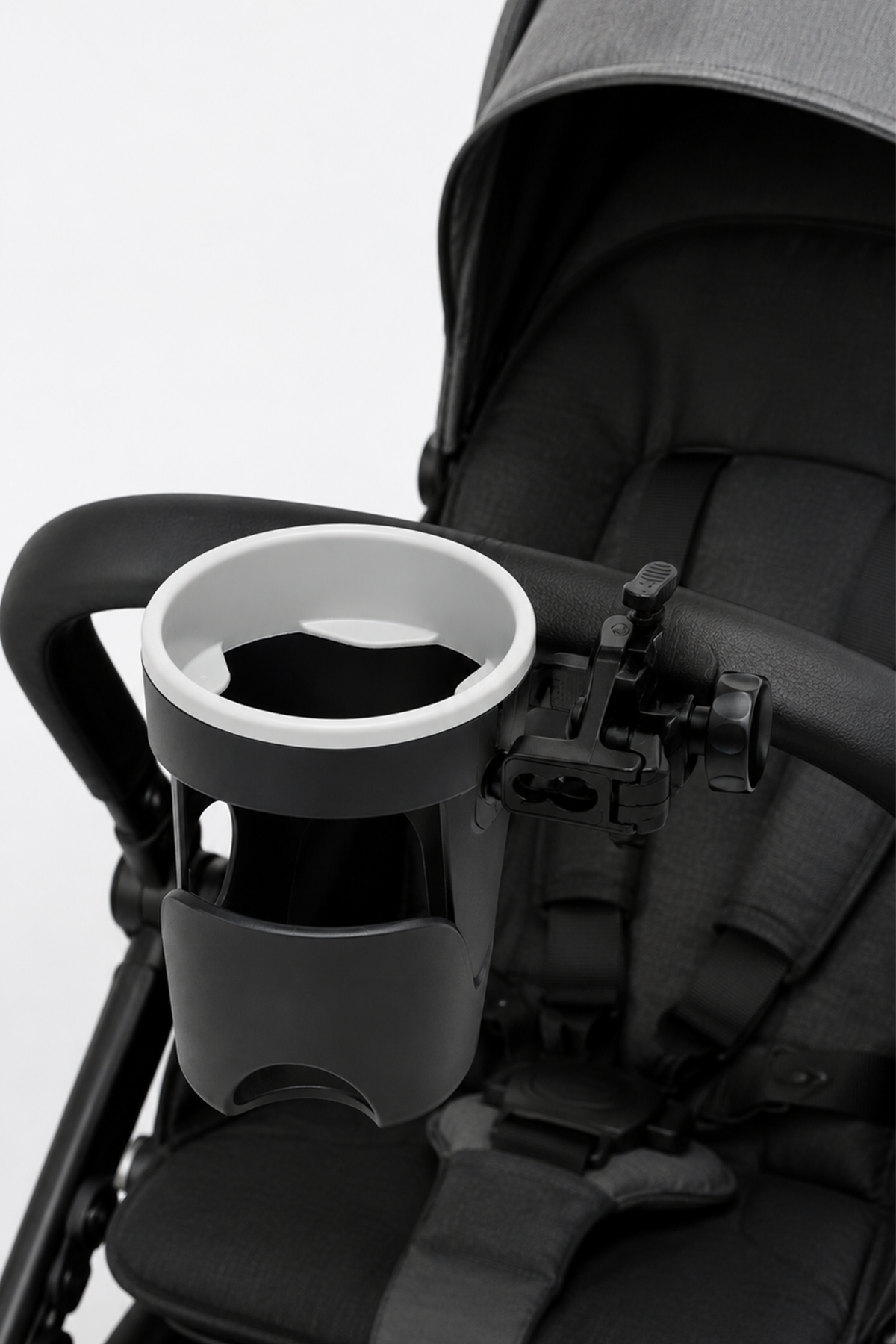 BABYSHOP black stroller cup holder attached to stroller with empty cup insert