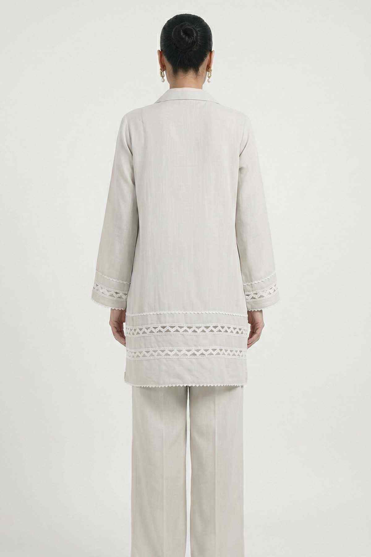 Light grey back view long tunic with lace-trim cuffs and hem, matching trousers.