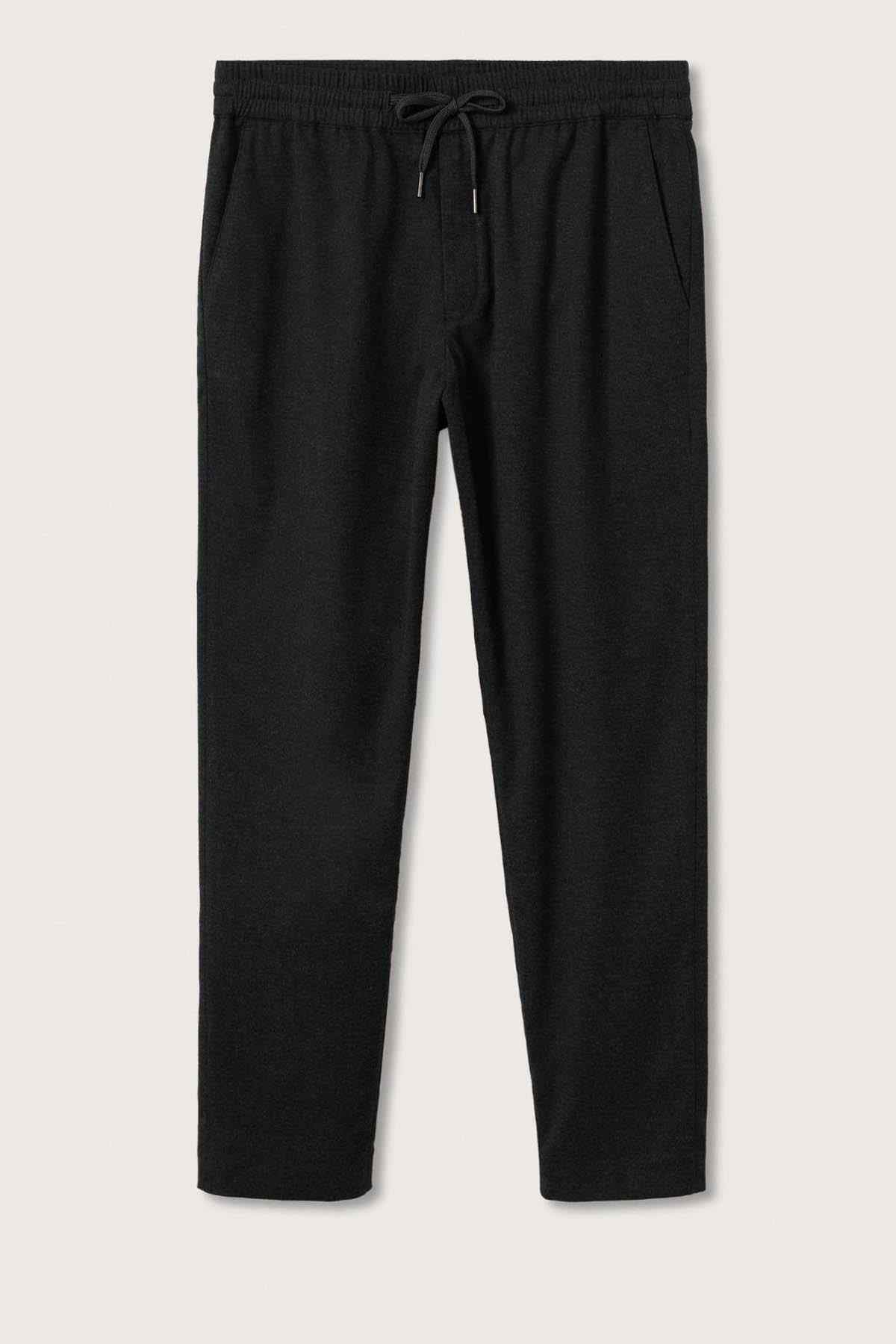 Dark jogger pants flat lay with elastic waistband and drawstring