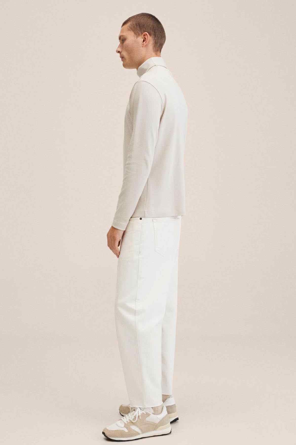 Men's ice grey turtleneck sweater and matching trousers set, side profile view