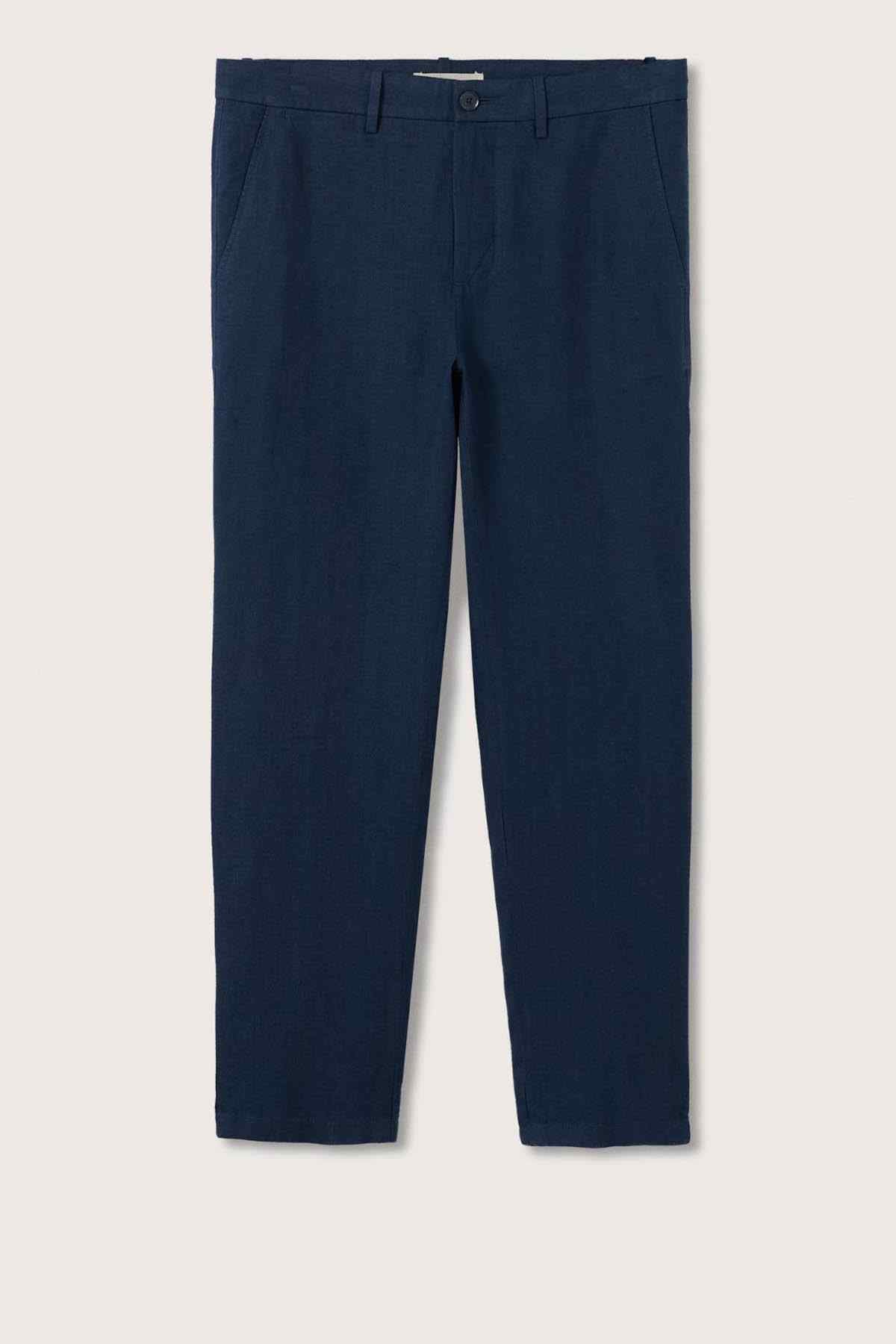 Navy trousers laid flat with button waistband and straight leg