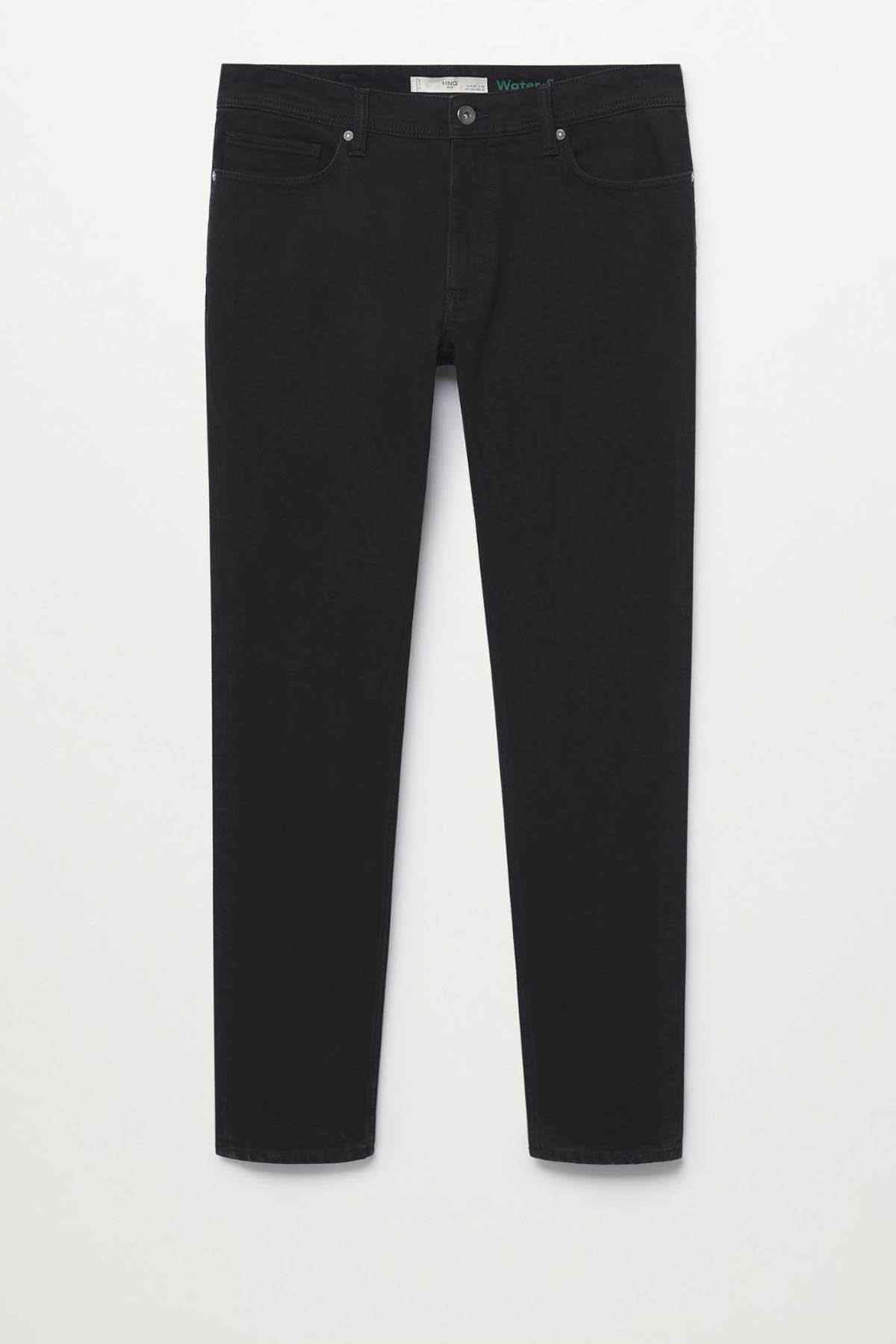 Black denim jeans laid flat, straight leg with five-pocket styling