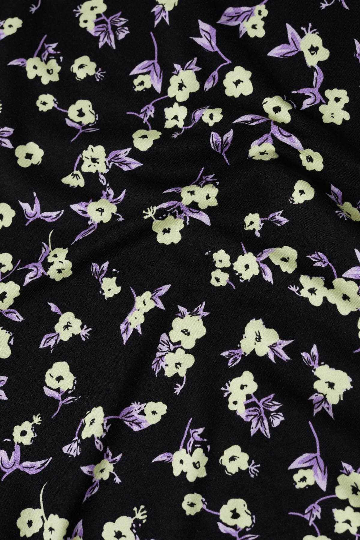 MANGO floral top fabric, black with scattered purple and light yellow flower pattern