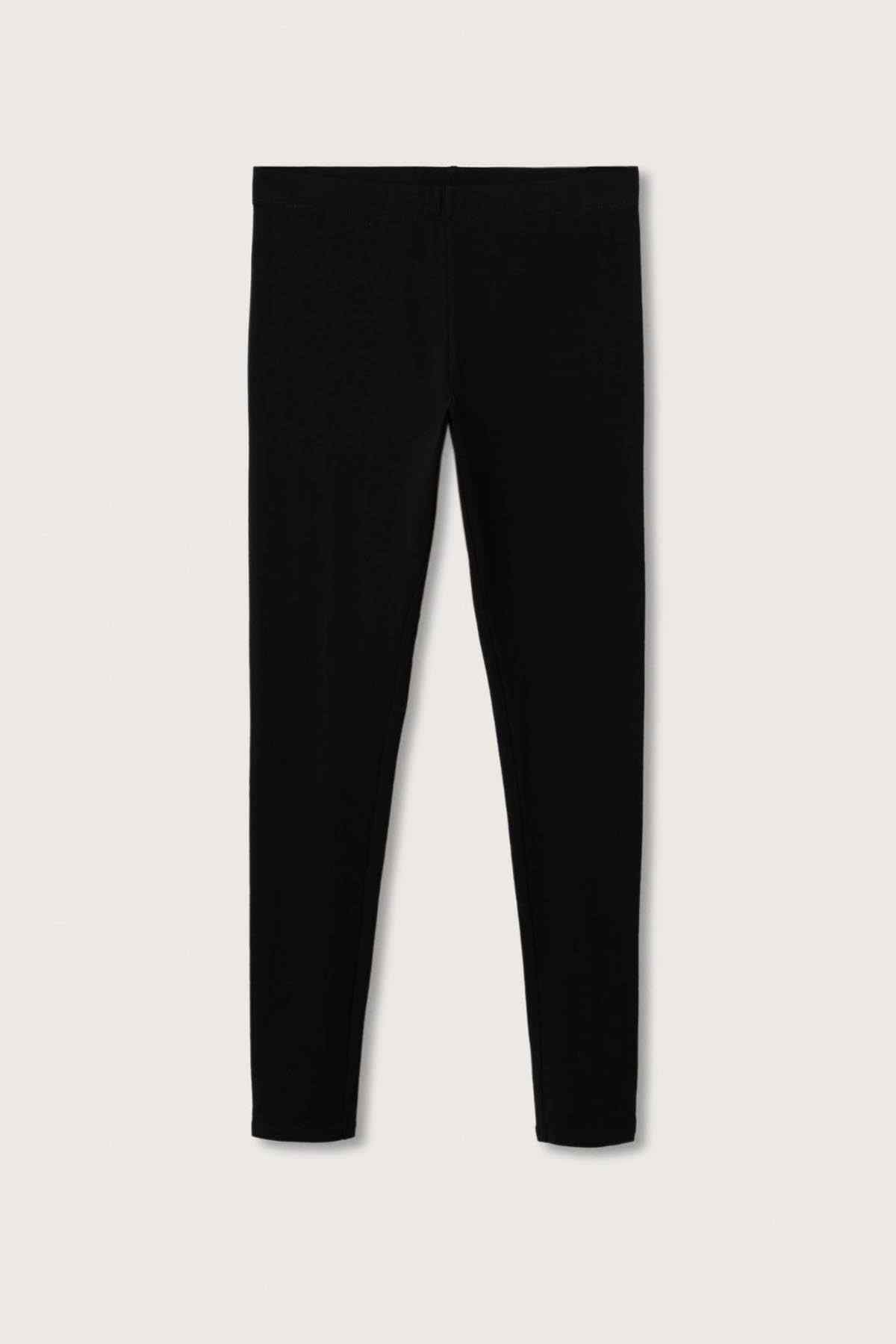 Black leggings flat lay, ankle-length slim legs