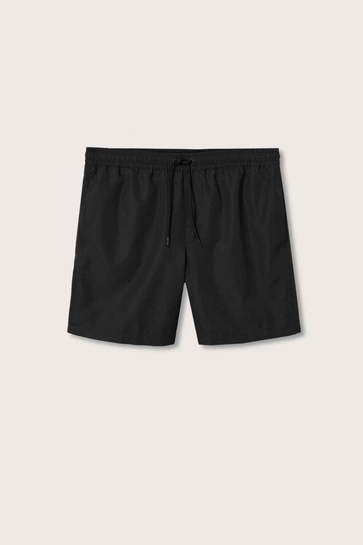 Mango black swim shorts flat lay with elastic waistband and drawstring