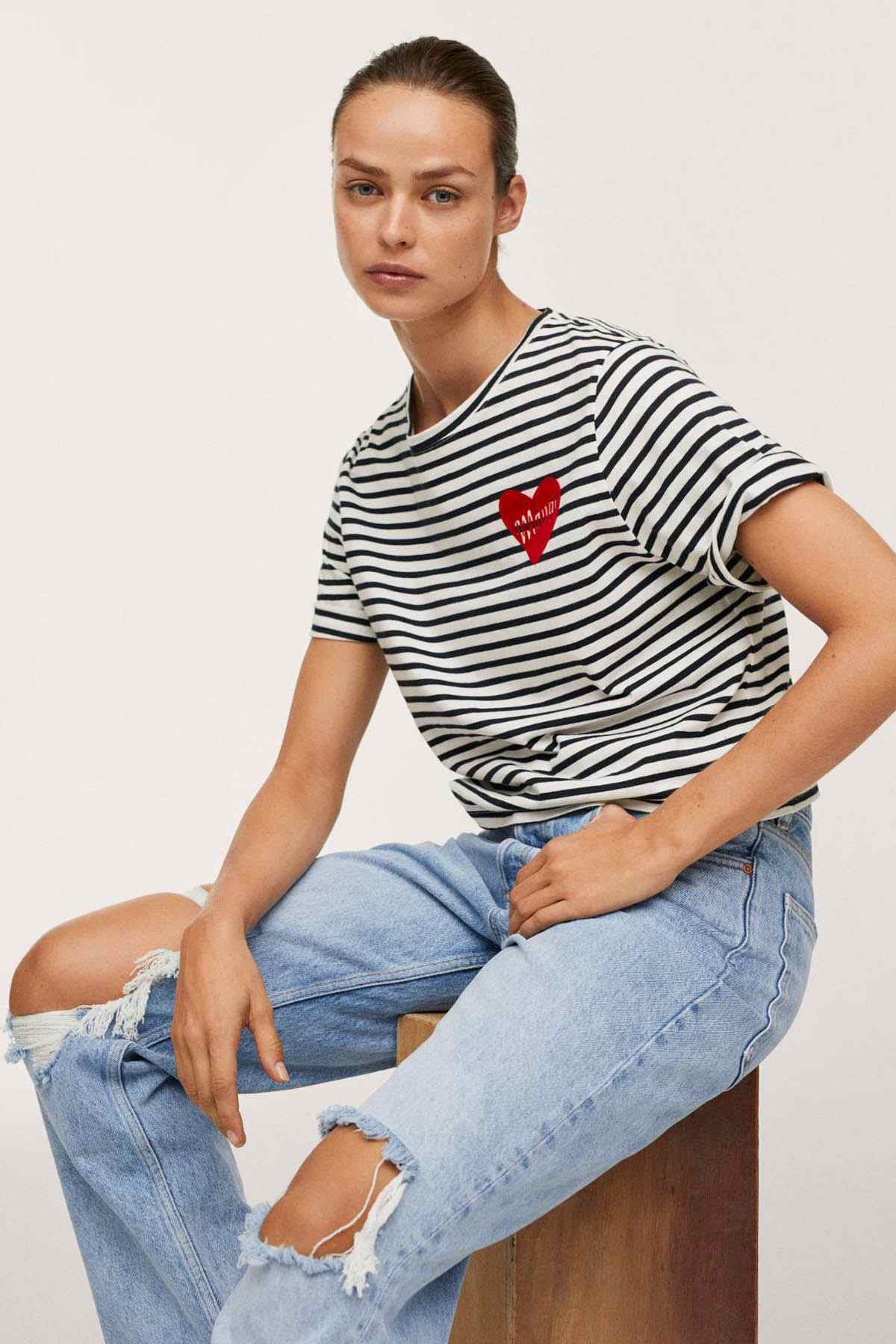 Navy-and-white striped T-shirt with red heart logo detail, crew neck