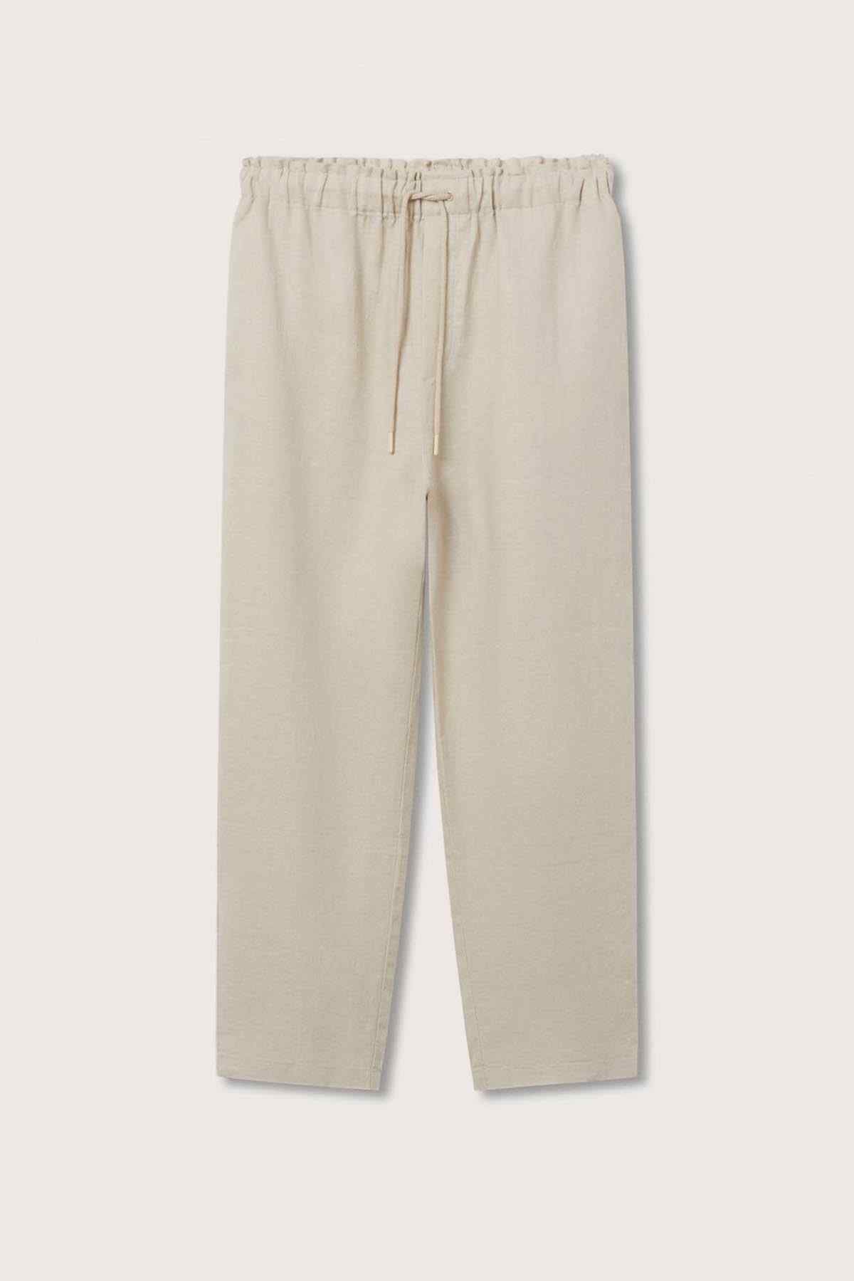 Light pastel grey drawstring trousers with elastic waist and straight cropped legs