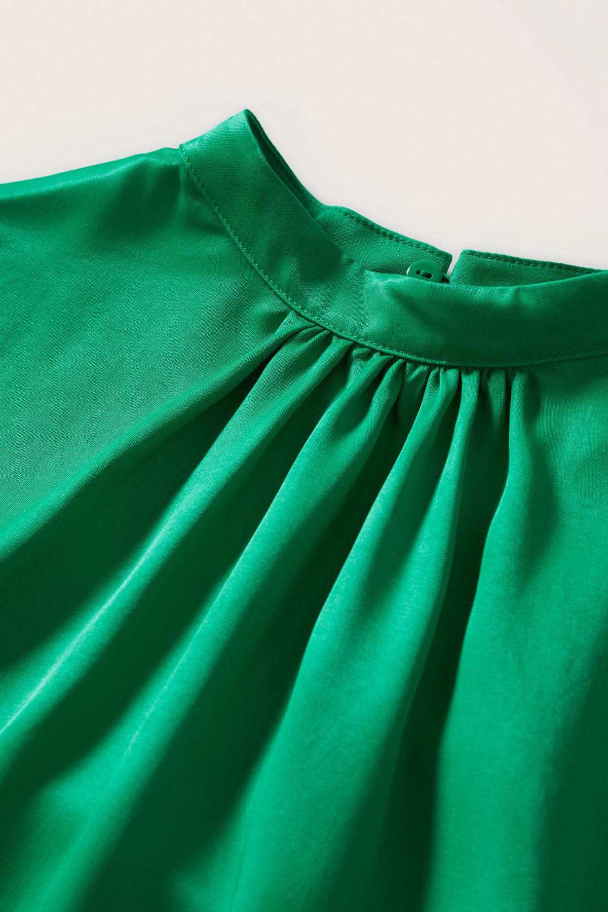 MANGO green top neckline with gathered pleats and button closure