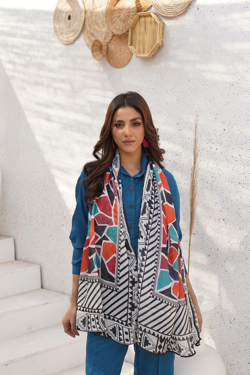 Geometric print sleeveless vest with tassel trim