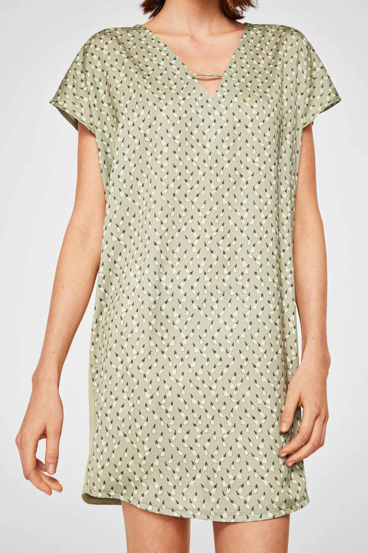 Mint green patterned V-neck mini dress with short sleeves