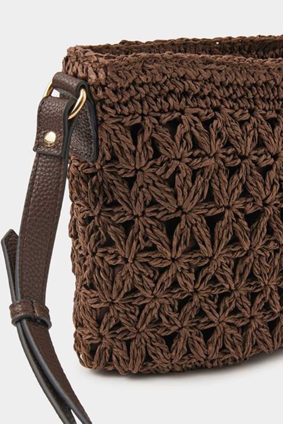 Chocolate crochet crossbody bag with woven texture and brown leather strap