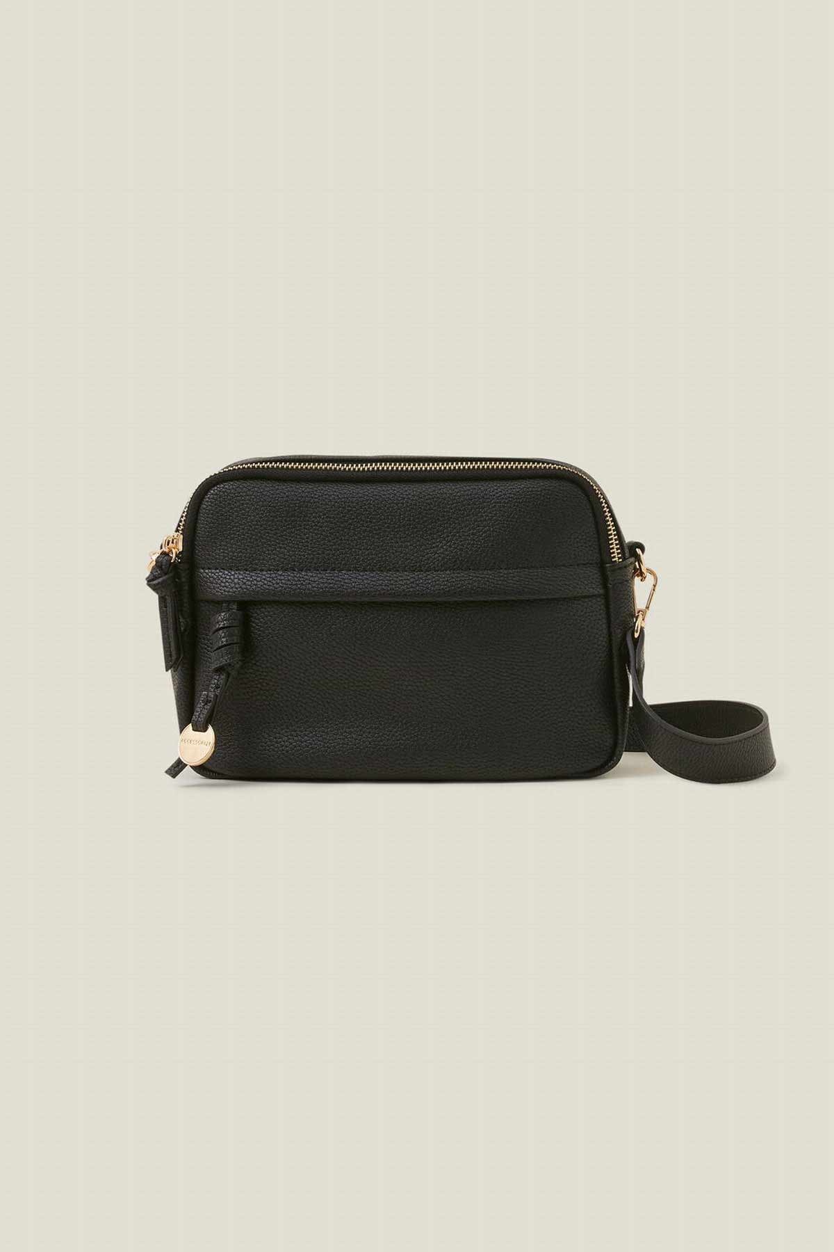 Black zip-up crossbody bag with adjustable strap and gold hardware
