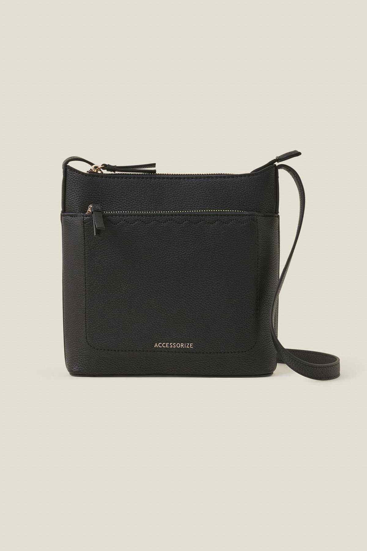 Black crossbody bag with front zip pocket and adjustable strap