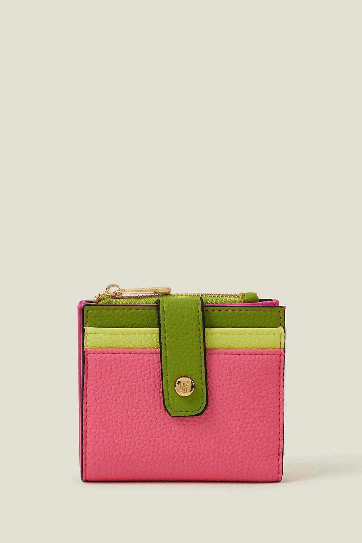 Pink leather-look mini wallet with green trim and top clasp