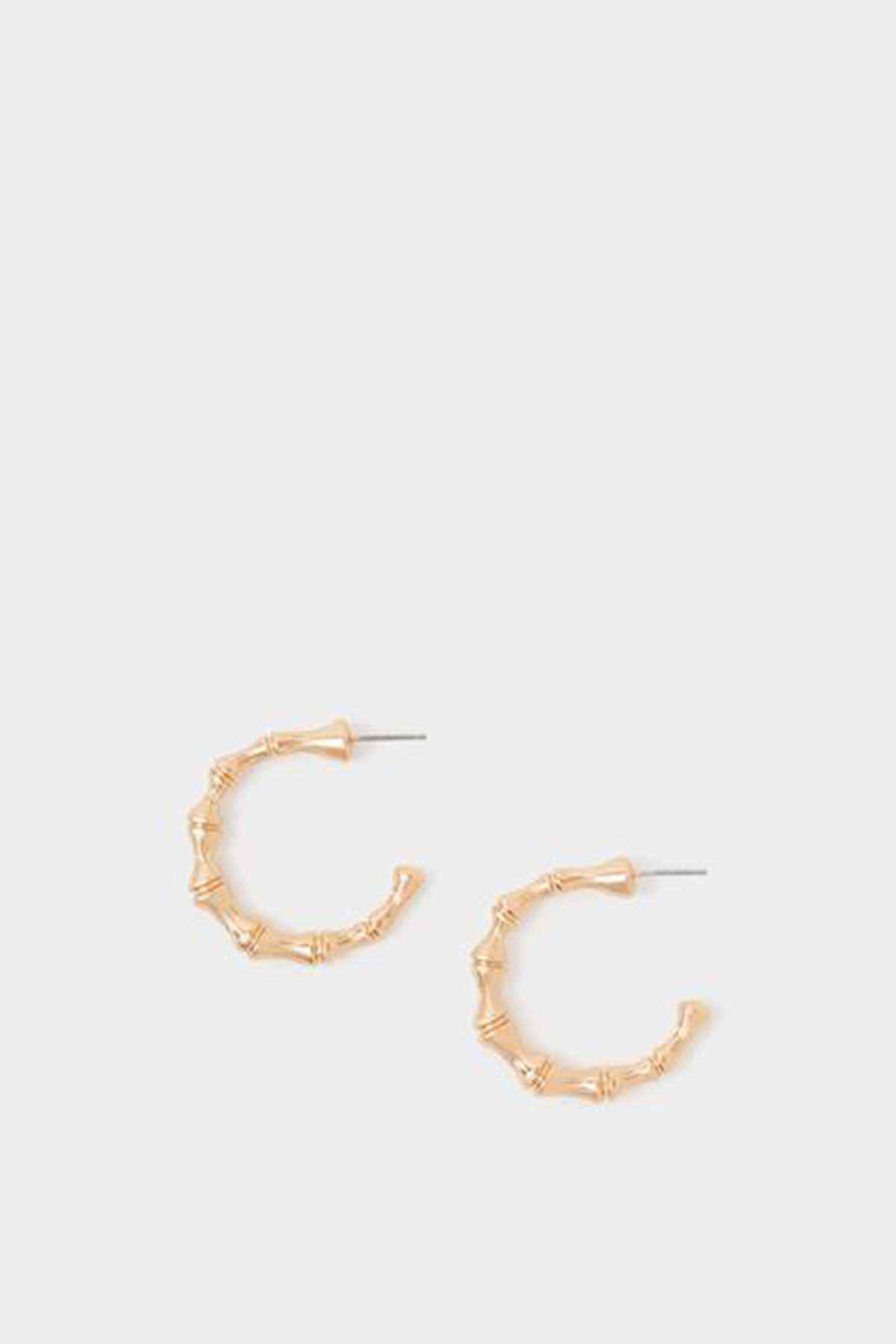 Small gold bamboo hoop earrings with textured link design
