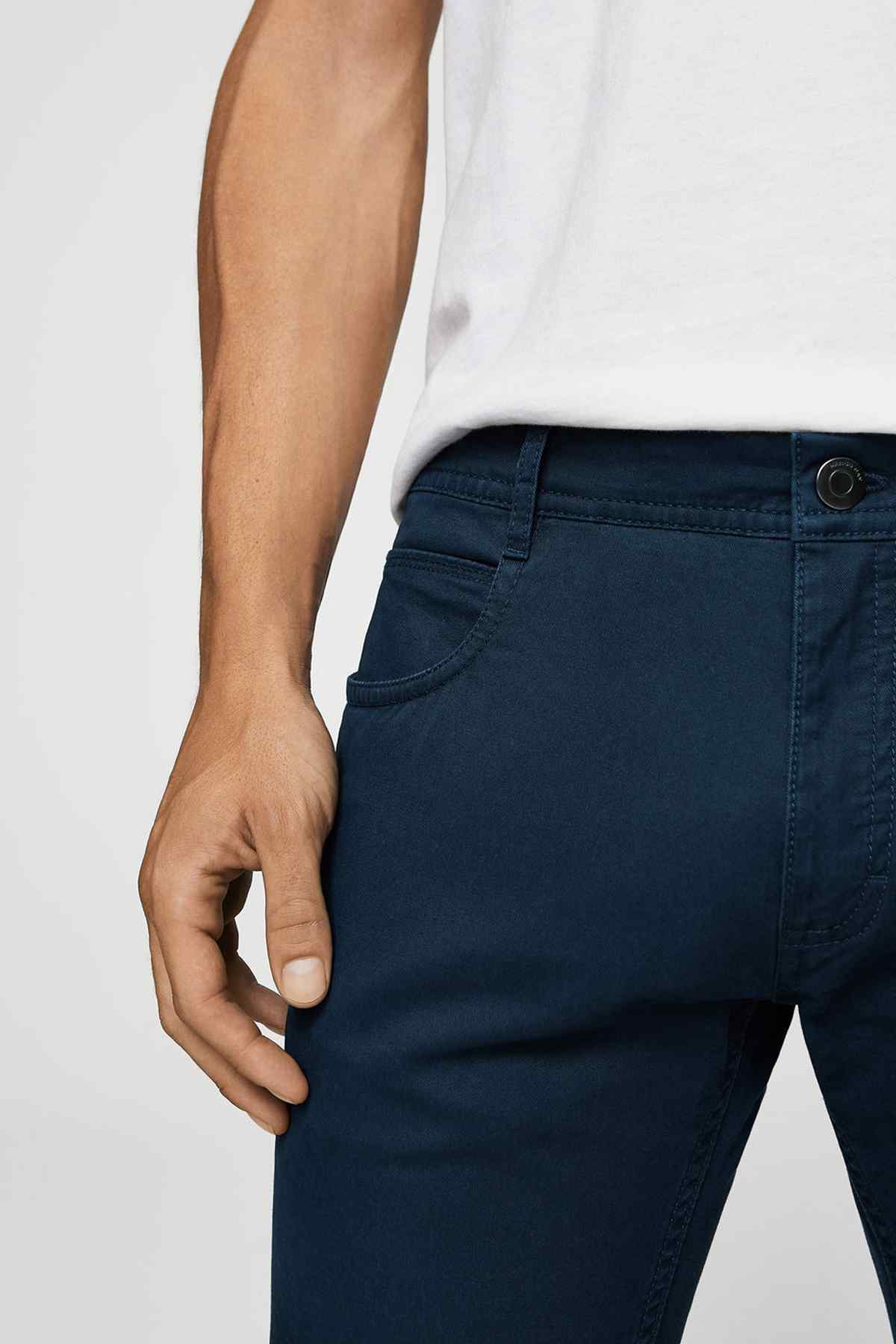 MANGO dark navy jeans with button closure and front pockets