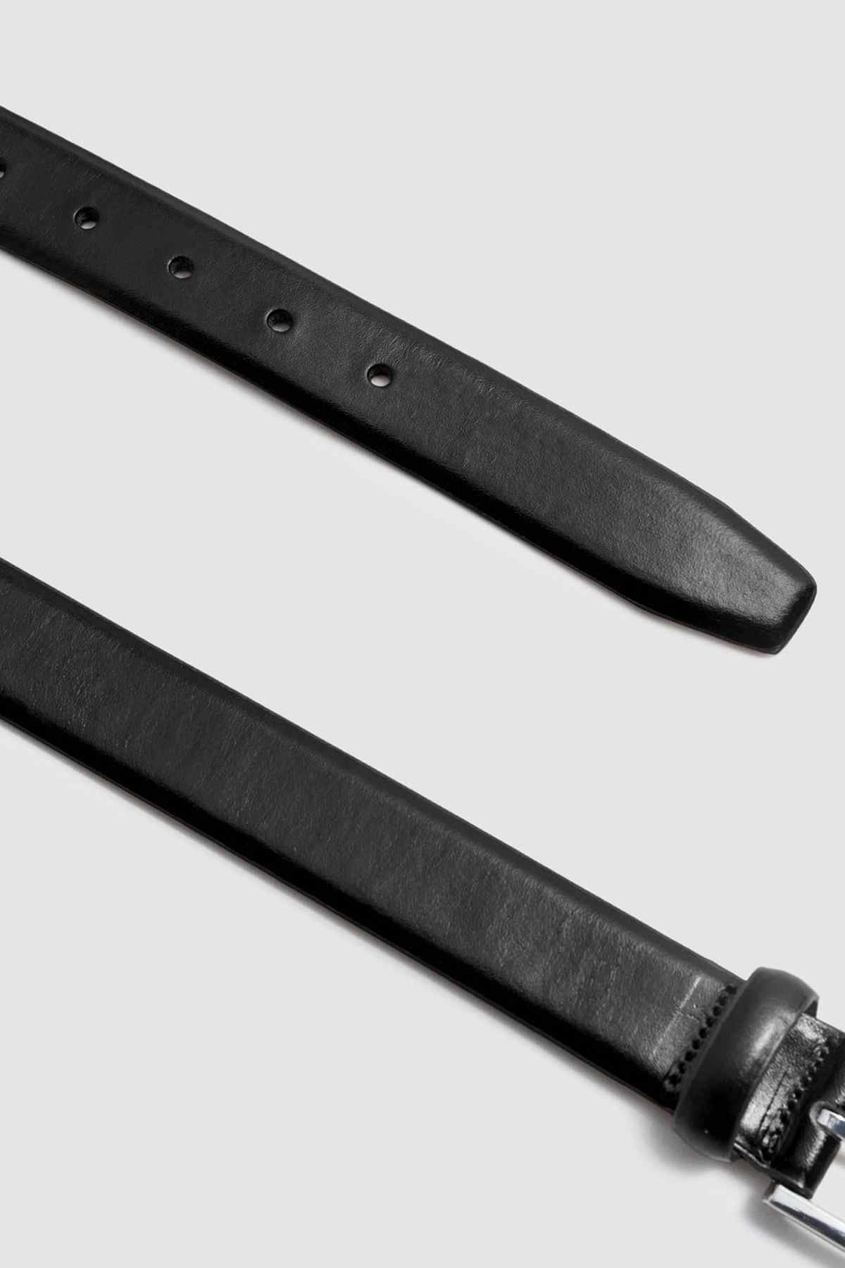 Black leather belt with punched holes and adjustable end for buckle