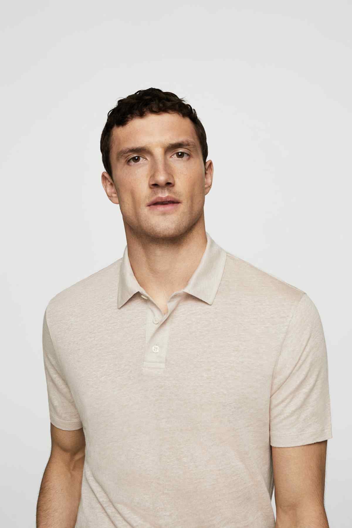 Beige short-sleeve polo shirt with open collar and button placket