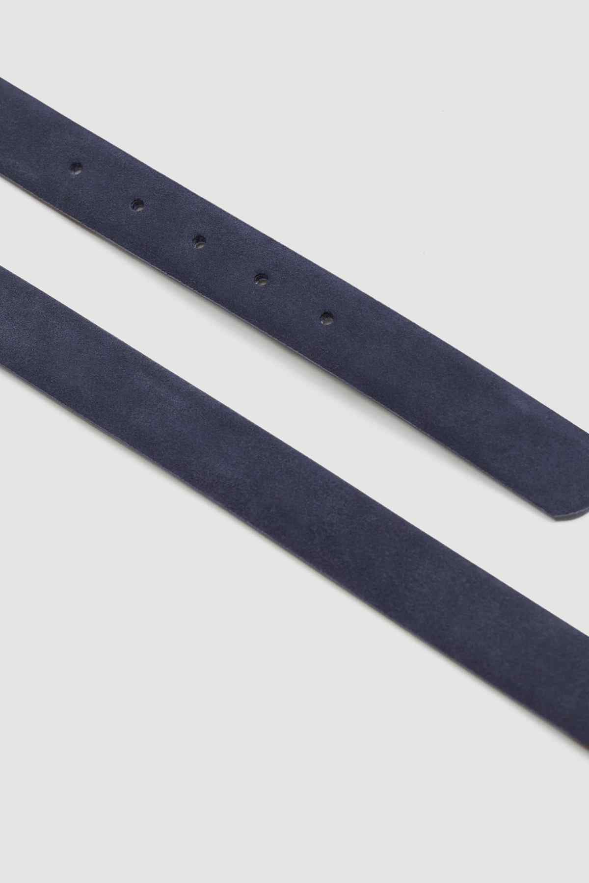 Navy fabric belt strap with evenly spaced punched holes