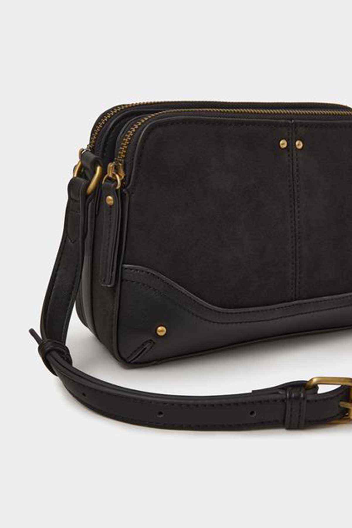 Black crossbody bag with side zip pocket and adjustable strap, gold hardware