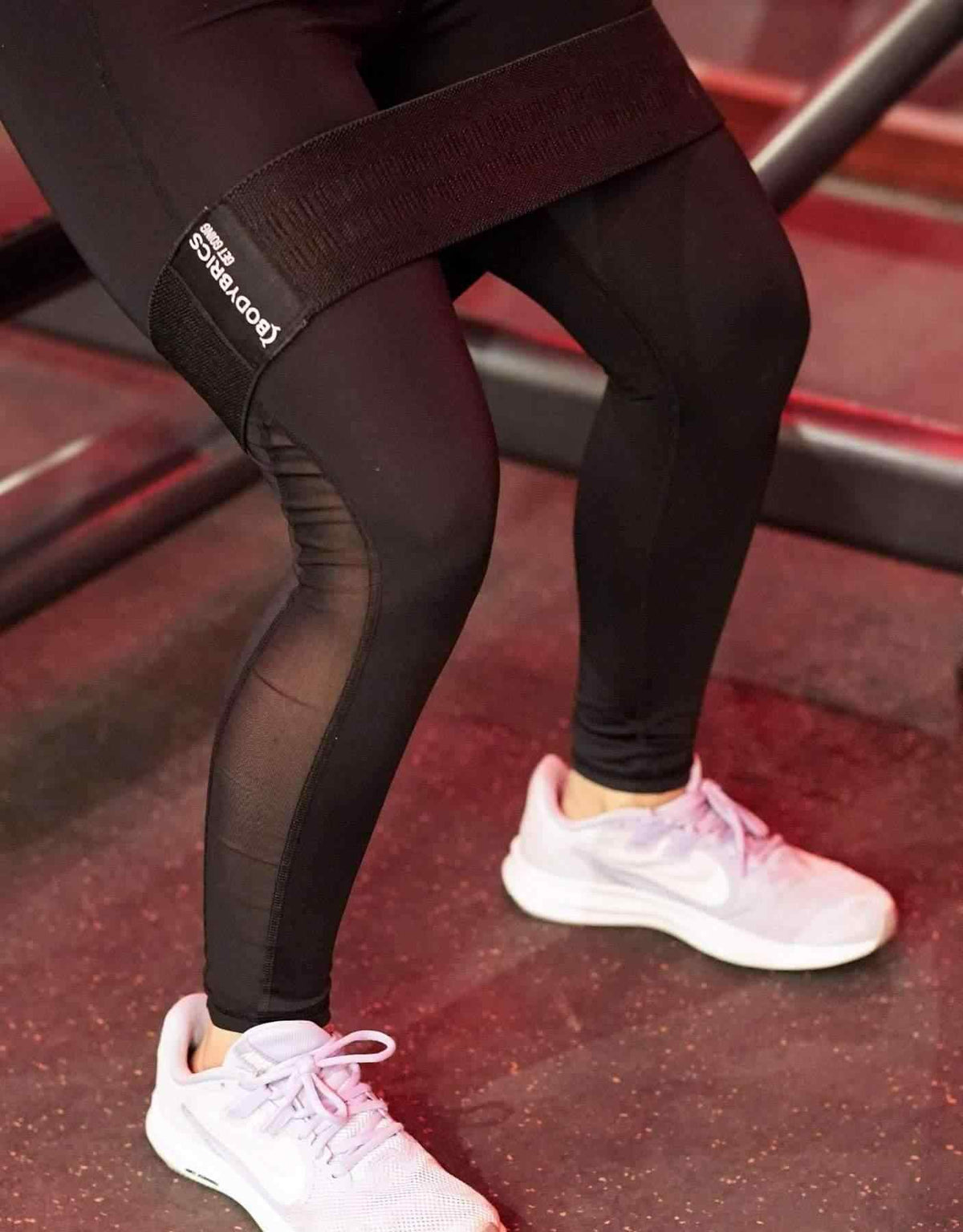 Bodybrics black workout leggings with sheer side panels and supportive waistband