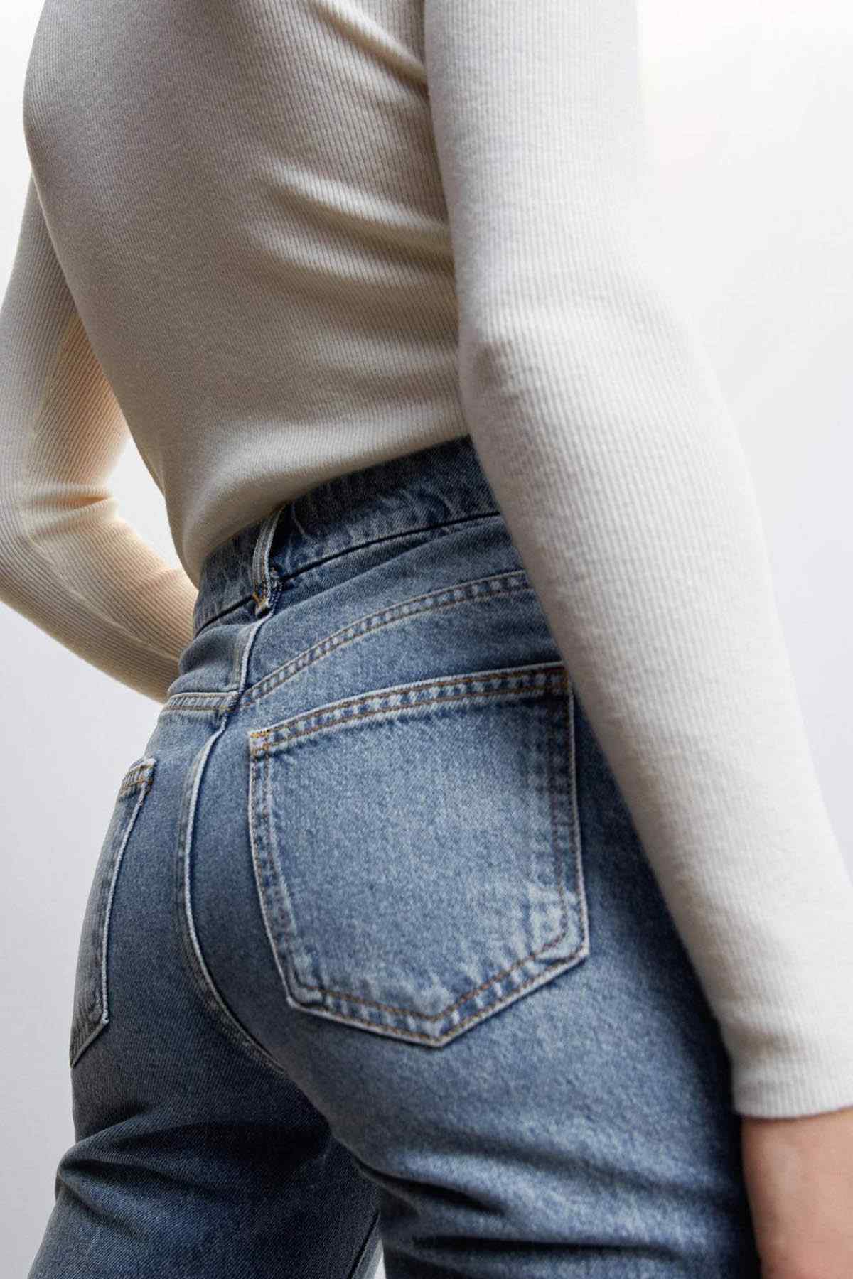 Mango dark vintage blue jeans close-up, back yoke and patch pocket