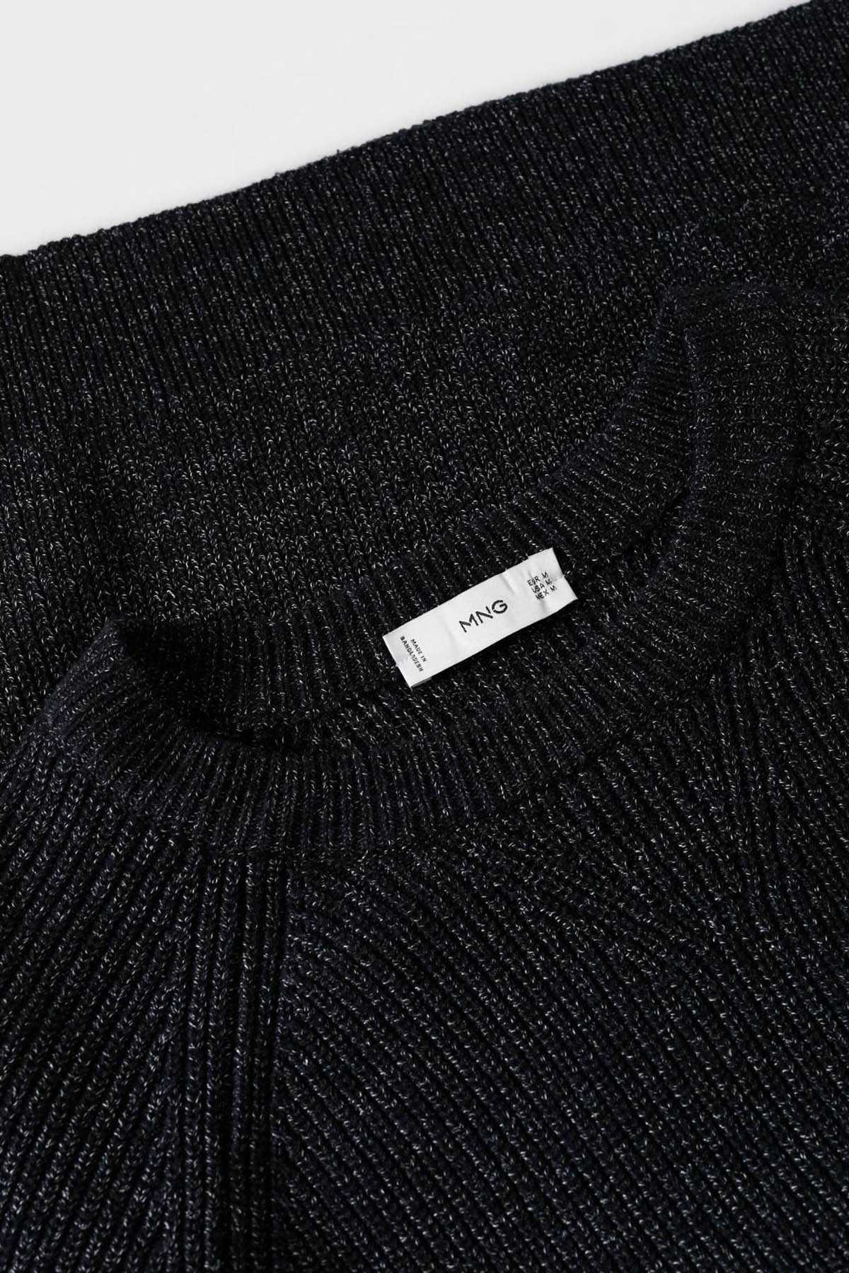 Navy knit sweater label at crew-neck with ribbed texture