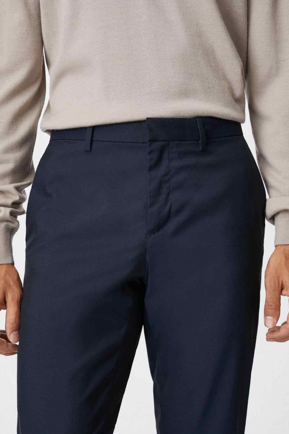 Mango dark navy front pants with belt loops, button closure, and crease details