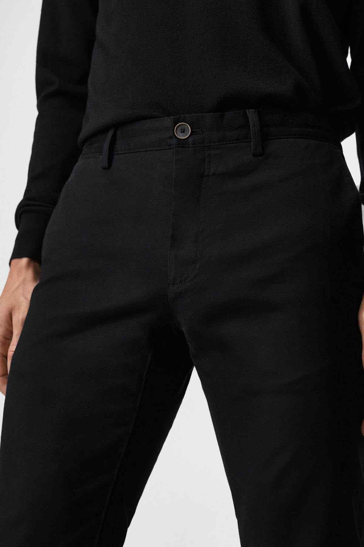 MANGO black trousers with button waistband, belt loops, and front pockets